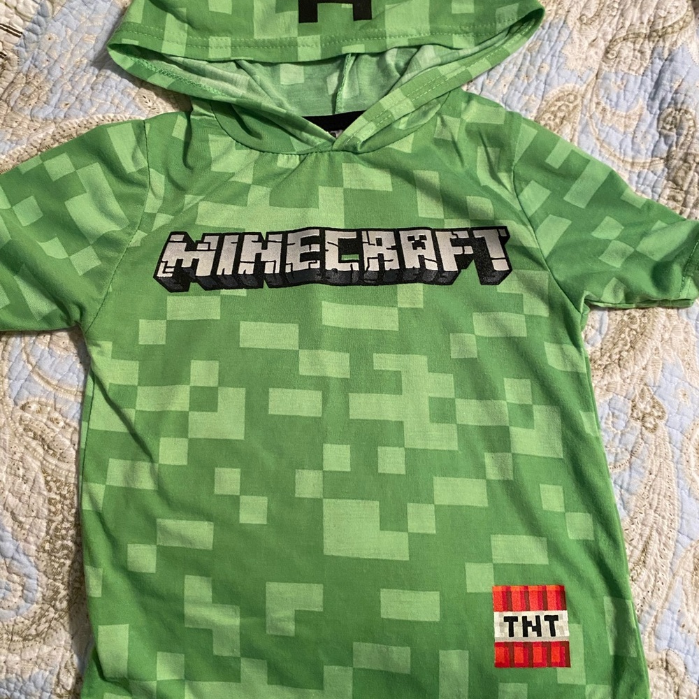 New without tags, short sleeve with hood